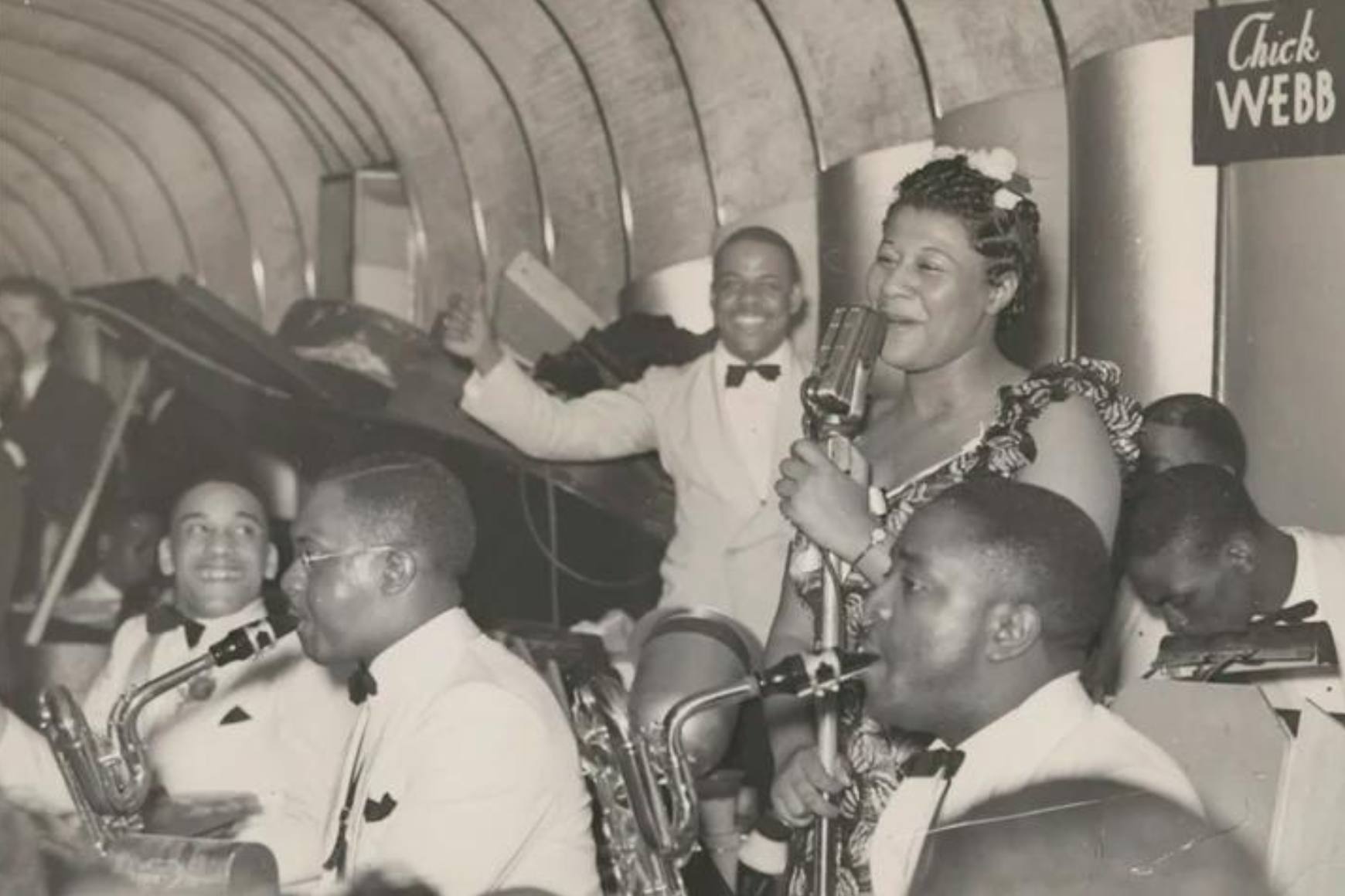 Chick Webb and musicians performing at The Savoy Ballroom. 